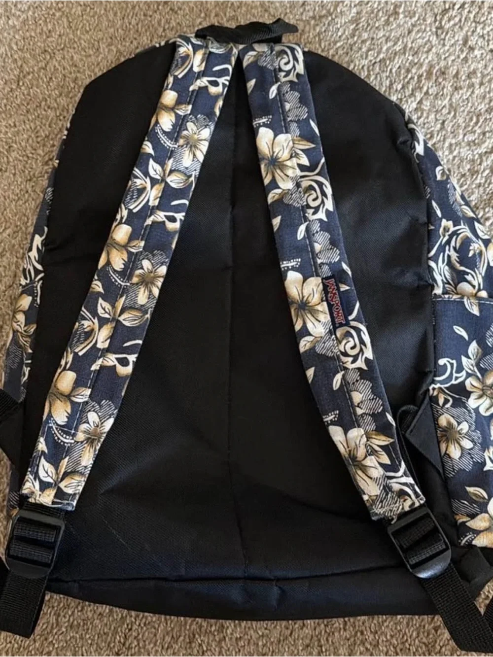 Jansport Navy Backpack with Cream Floral Print